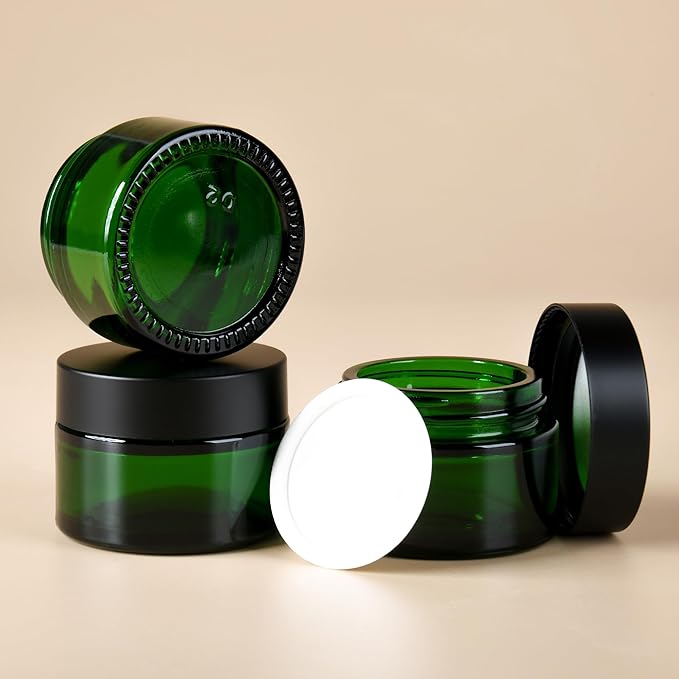 1 oz Reusable Green Glass Container Jars 24 Pack with Wide-mouth Leak Proof Cap and Inner Pull-On Lid for Travel Storage Makeup, Face Creams, Body Lotions, DIY Crafts or Others